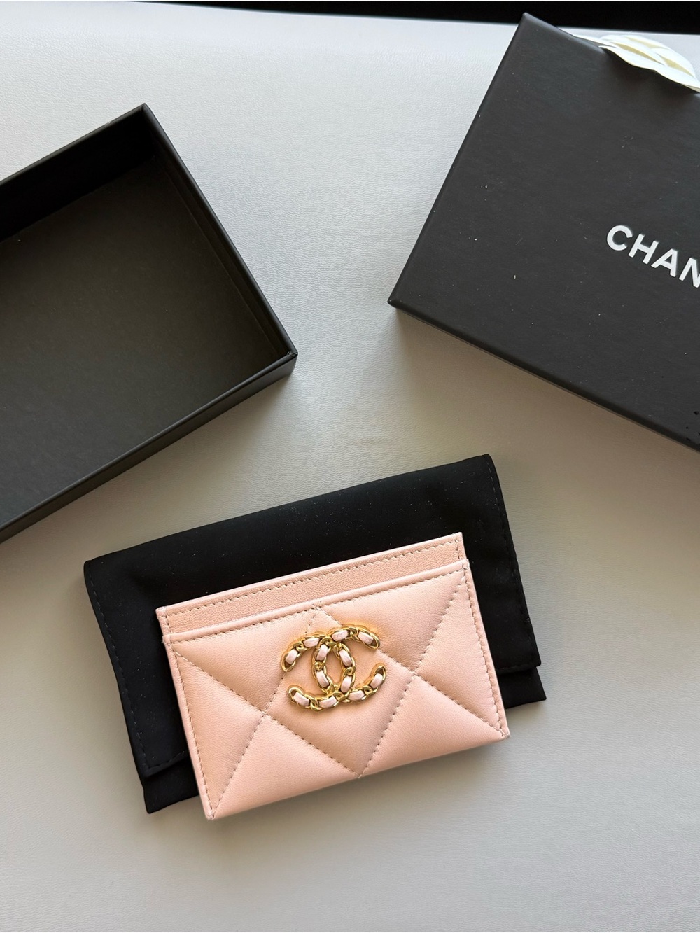 CHANEL Pale Pink Quilted Card Holder with Gold CC Logo